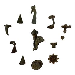 Roman British - Roman copper alloy hollow cast fibula or crossbow brooch, together with circular plate brooch, disc brooch, and bow and fantail brooch fragments, some with spiral and knot motif decoration, all circa 1-300 AD (11)