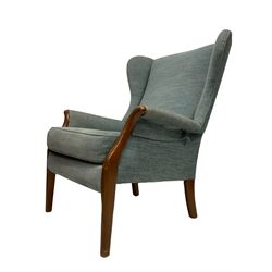 Parker Knoll - 'Froxfield' fireside wingback armchair, upholstered in pale teal fabric, on tapering supports