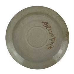 Mick Arnup (1925-2008) studio pottery plate, decorated in muted glaze with abstract floral decoration, signed Arnup, dated (19)98, D27.5cm