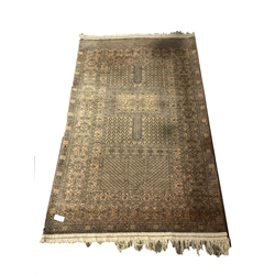 Tribal Hadklu design ground rug, with Mihrab motif enclosed by double guarded border, (125cm x 210cm)