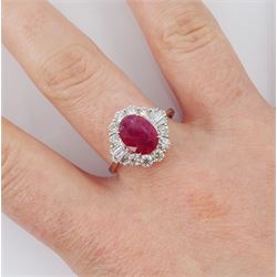 18ct white gold oval cut ruby, round and baguette cut diamond cluster ring, stamped 750, ruby 1.78 carat, total diamond weight 0.88 carat, with World Gemological Institute Report