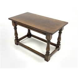  Traditional oak rectangular coffee table, with rectangular top raised on turned and block supports united by stretchers, 84cm x 52cm, H46cm  