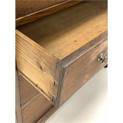 George III oak chest, moulded top over two short and three long graduated drawers, raised on shaped bracket supports 