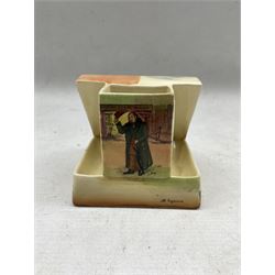 Royal Doulton Series ware match striker and cigarette holder, decorated with characters of Bill Sykes and Mr Squeers, printed marks and number D5175 H8.5cm 