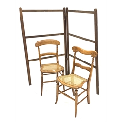Two Victorian beech framed bedroom chairs with cane seats and a 19th century pine clothes horse
