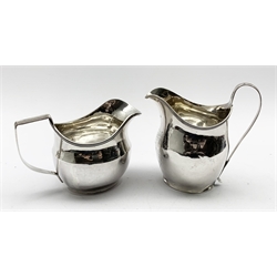 George III silver cream jug with an engraved shield shape cartouche and reeded loop handle London 1801 Maker probably Bateman family and another George III silver cream jug London 1808 Maker John Merry 7.3oz
