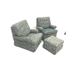 Parker Knoll - Pair of armchairs upholstered in blue floral fabric, and raised on castors, W87cm with matching footstool