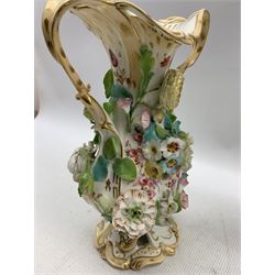 Victorian Coalbrookdale type floral encrusted twin handled vase, of baluster form, hand painted with floral sprigs with scroll peach ground handles and base, c1843, kite mark beneath, H28cm, together with a similar vase (2)
