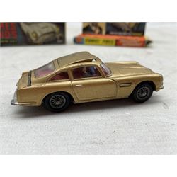 Corgi Toys 261 diecast Special Agent 007 James Bond's Aston Martin DB5 from the James Bond Film Goldfinger with two bandit figures, boxed with pictorial diorama stand
