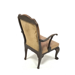 18th century walnut open armchair, shaped cresting rail over seat and back upholstered in red silk damask, swept and scrolled arm terminals, raised on leaf carved cabriole front supports terminating in ball and claw feet