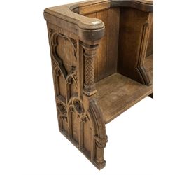 19th century oak four seat church pew or choir stall, shaped and moulded top rails over boarded back and moulded upright divisions, single plank seat, the ends with turned floral carved pilasters, one end with Gothic style tracery work

Provenance - St. Giles Cathedral, Edinburgh