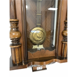 Late 19th century walnut and beech cased Vienna wall clock, twin train movement striking on coil, with pendulum, H69cm