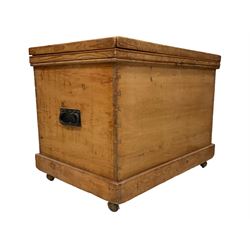 Late 19th century rustic pine blanket chest, rectangular hinged lid with iron fixings, iron handles to each side, on castors