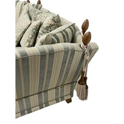 David Gundry - Knole design drop-end two-seat sofa, upholstered in blue and light grey striped fabric with scatter cushions, on square tapering feet with brass cups and castors
