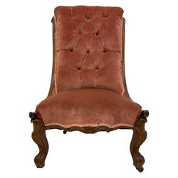 William IV walnut framed nursing chair, scrolled cresting rail with acanthus leaf decoration, upholstered in buttoned pale pink fabric with sprung seat, raised on cabriole supports with applied scrolling, brass and ceramic castors