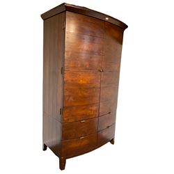 Barker & Stonehouse - Navajos reclaimed chestnut double bow front wardrobe, two cupboard doors enclosing hanging rail, the base fitted with four drawers