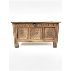 18th century oak coffer with triple panelled hinged lid and lozenge carved front on stile supports W110cm