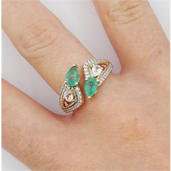 9ct gold pear shaped emerald and white zircon openwork crossover ring, hallmarked 