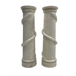 Pair of 20th century white painted oak turned tapering columns, with applied entwined snake decoration (H99cm)