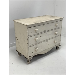 Victorian painted pine three drawer chest, with shaped apron and turned supports 