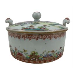 Pair of 18th century Chinese Export porcelain butter tubs and covers, enamelled in famille rose colours with exotic birds in a garden setting with peonies, chrysanthemum and branches of flowering prunus issuing from rockwork, withing iron red and gilt borders, L12.5cm (2) Provenance: From the Estate of the late Dowager Lady St Oswald