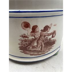 Early 19th century Herculaneum demi lune bough pot with crimped rim printed with a bust portrait of Nelson and inscription 'England Expects........' flanked by prints of children at play, edged in blue and on bun feet H21cm x W21cm