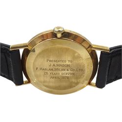 Omega Geneve gentleman's 9ct gold manual wind presentation wristwatch, Cal. 1030, silvered dial with date aperture, London 1974, on original black leather strap with gilt Omega buckle