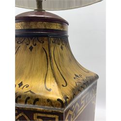 Contemporary hexagonal toleware table lamp in the form of a Chinese tea canister, decorated in gilt with traditional scenes together with another similar table lamp on paw feet, both with green pleated silk shades, max H80cm (2)