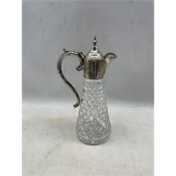 Elizabeth II silver-mounted glass claret jug, the silver mount with chased floral decoration and scroll handle, by Charles S Green & Co. Birmingham, 1975 H33cm