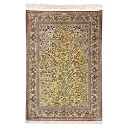 Fine silk Persian Qum tree of life rug, arched field with trailing tree branch decorated with animal and bird motifs, overall floral decoration, the guarded border with with repeating flower head design, signature panel to top