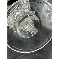 19th century clear glass water jug, of squat form with flared rim H17.5m, together with an early 20th cenutry Venetian glass stand, of circular form with twisted top section, three reeded supports and knopped stem on a domed circular foot (2)