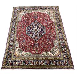 Hand knotted Persian rug, with navy blue boarder with red field 393cm x 310cm 