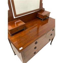 Early 20th century mahogany dressing chest, raised shaped swing mirror with two trinket drawers, fitted with two short and two long drawers, on square tapering supports with castors