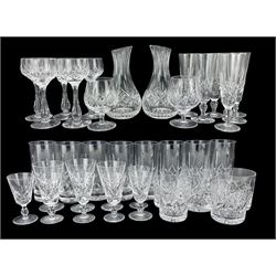 Part suite of Stuart Glengarry pattern crystal drinking glasses comprising two carafes, five hock glasses, eight highball tumblers, two brandy glasses, three small wine glasses, two tumblers, four liquor glasses and six champagne glasses, together with a Thomas Webb cut glass bowl and other glassware