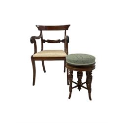 Mahogany regency style carver chair, the shaped cresting rail over scrolled arms and drop in seat pad, raised on sabre supports (W61cm) together with music stool