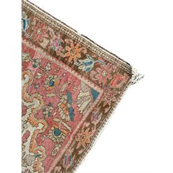 Persian pale ground rug, central medallion in field of trailing branch and plant motifs, the spandrels decorated with flower head motifs, repeating border