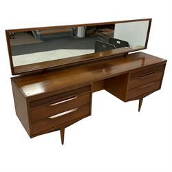 White & Newton - mid-20th century teak kneehole dressing table, raised mirror back, fitted with two banks of three drawers, raised on tapering supports, with matching stool 