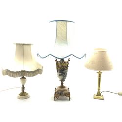 Continental Empire style marble and gilt metal table lamp, of urn form with twin scroll handles, central female mask issuing floral swags, converted to electric, H43cm, together with two lamps (3)