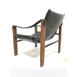 Maurice Burke for Arkana - Mid 20th century 'Safari' chair, with black vinyl seat back and arm rests, raised on square supports, the seat stamped 'Arkana Falkirk, Scotland' under