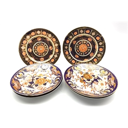 Set of four early 19th century Crown Derby plates decorated in the Kings Imari pattern, D22cm together with a pair of Royal Crown Derby shaped plates, pattern no. 4947 (6)