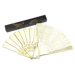 19th century ivory silk and bone fan with pierced and decorated gorge and guards H24cm together with a pierced bone fan in black lacquer fan box