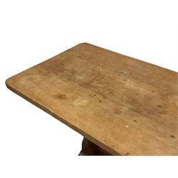 Yorkshire Oak - oak dining table, rectangular adzed top on quadruple octagonal pillar supports, sledge feet united by floor stretcher, unsigned 