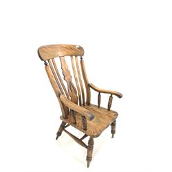 Victorian walnut farmhouse armchair, shaped and pierced splat, saddle seat, raised on turned supports with double 'H' stretcher