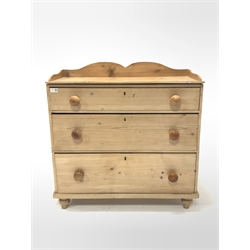 Victorian stripped pine chest, with raised back, fitted with three long graduated drawers, raised on turned supports, W88cm, H85cm, D40cm