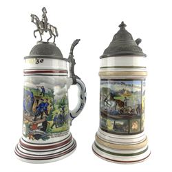 Two German beer steins, each decorated with artillery scenes and both having lithophane bases and pewter covers, H28cm 