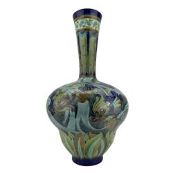 Large Burmantofts Faience partie-colour vase, of bellied bottle form with tapering neck, tube lined and incised with classical dolphin swimming amongst marine foliage, impressed factory marks beneath, model no. 2123, painted Col No. 80, H53cm