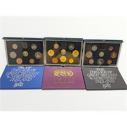 Three Royal Mint proof coin collections dated 1983, 1985 and 1986, in blue folders with certificates and three coin sets dated 1970, 1981 and 1982, in plastic displays with card wrappers