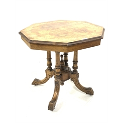 Victorian walnut occasional table, octagonal top with boxwood marquetry inlay, raised on turned cluster column support and four scroll carved splayed feet with castors, 