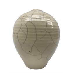 Rudie Delanghe (British 1955-): Studio pottery raku vase of ovoid form with partial crackle glaze, signed and dated '86 H19cm