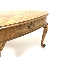 Large early to mid 20th century Georgian style walnut kidney shaped library table, the cross banded and moulded top over frieze fitted with five drawers, raised on leaf and shell carved cabriole supports with ball and claw feet